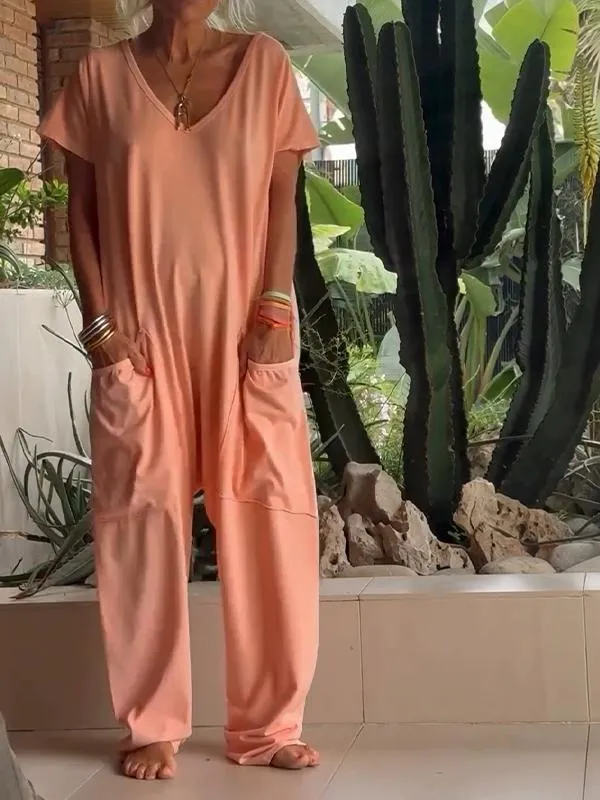 Avslappnad V-ringad enfärgad jumpsuit